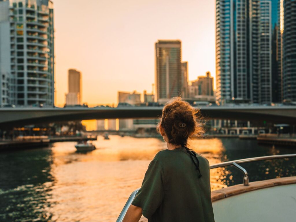 Enjoying a stunning sunset over Dubai Marina from a luxury yacht.
